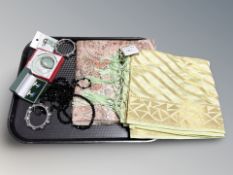 A group of items to include a silk brocade shawl, a further Paisley shawl,