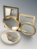 A group of reproduction gilt and silvered mirrors,