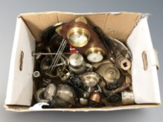 A quantity of metal wares, brass candlesticks, teapots,