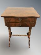 A continental mahogany work table,