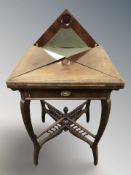 A Victorian mahogany envelope card table,