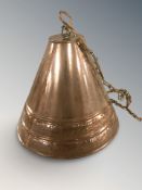 A Scandinavian copper finish conical pendant light shade, height 24 cm.