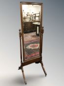 An early 20th century mahogany framed cheval mirror,