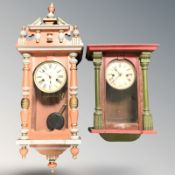 Two continental painted wall clocks, largest 63 cm high.