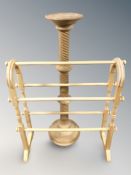 A modern towel rail and a beech torchere.