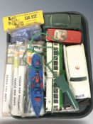 A group of miniature hobby kits, model cars, etc.