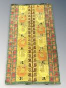 A flatweave pictorial kilim depicting columns of stylised birds,