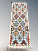 A Chobi Kilim runner, 154 cm x 53 cm.