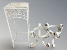 A mesh fire screen, a pair of wrought metal plant stands and a further plant stand.