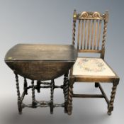 An oak barley twist drop leaf table,