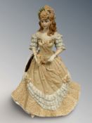 A Coalport matt-glazed china figure : Age of Elegance - Easter Bonnet, 21 cm.