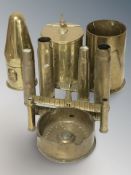 A group of brass ornaments, inert bullets and shell casings, etc.