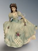 A Coalport matt-glazed china figure : Age of Elegance - On the Balcony, 18 cm.