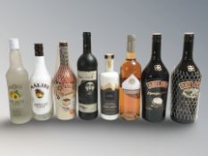 Eight modern bottles of alcohol including Baileys, Malibu, etc.