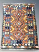 A Chobi Kilim rug, 120 cm x 84 cm.