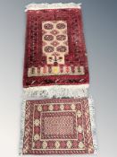 A Turkoman prayer rug, Afghanistan, 140 cm x 78 cm, plus a further Afghan rug.