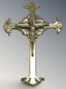 A brass crucifix, length 30 cm.