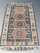 An Eastern flatweave Kilim, 220 cm x 130 cm.