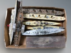 A group of scale model battleships, paddle steamer, ocean liners, etc.