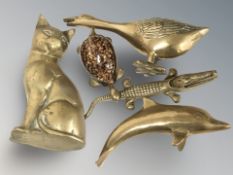 A group of brass animal figures, tallest 15 cm.