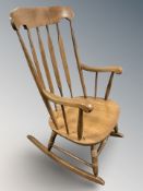 A modern beech rocking chair.