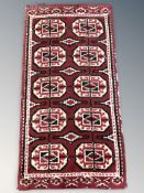 A woolen rug of Turkoman design,