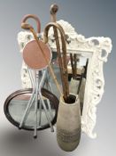 A studio pottery floor vase, rustic walking sticks, shooting stick, riding crop and two mirrors.