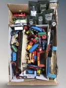 A group of die cast scale models including tanks, Titanic, trains, etc.