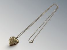 A 9ct gold heart locket on chain CONDITION REPORT: 2.