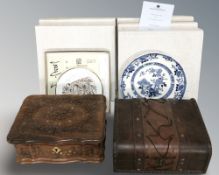 A group of boxed collector's plates, an Indian heavily carved hardwood table box,