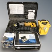 A DeWalt drill, in case, a seven piece diamond cord drill kit, a transformer, etc.