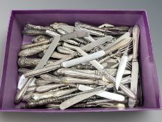 A large collection of silver handled items including sets of knives, button hooks, shoe horns, etc.