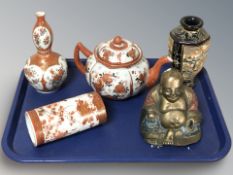 Three pieces of Japanese Kutani porcelain, metal figure of Buddha and a further Japanese vase.