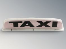 A taxi roof light, width 62 cm.