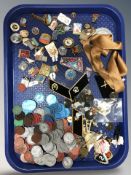 A group of Soviet enamel badges, other decorations, milk tokens, buttons, etc.