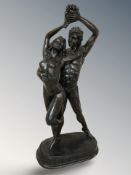 An Academy bronze effect nude figure group, height 60 cm.