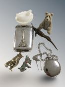 A French silver plated cigarette case depicting the Eiffel Tower,