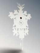 An Italian Diamantini Domeniconi cuckoo clock, with pendulum.