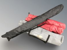 A group of folding camping chairs,