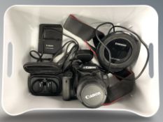 A Canon EOS650D digital camera with Canon zoom lens 18-55mm, charging cable,