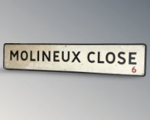 An enamelled metal Moulinaux Close street sign,