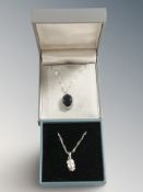 Two flat link silver necklaces, one with silver owl pendant,