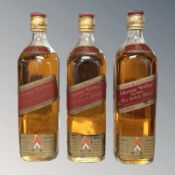 Three bottles of Johnnie Walker Red Label Old Scotch Whisky, 70% proof, each bottle 26 2/3 fl. oz.