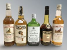 Five bottles of alcohol including Gordon's gin, Famous Grouse, Teacher's Scotch whisky, etc.