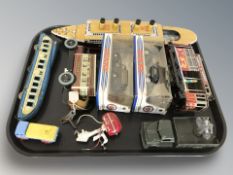 A tin plate model of the Titanic, several other models, two boxed Dinky vehicles, etc.