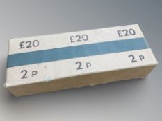 A sealed case containing twenty pounds of uncirculated two pence coins.