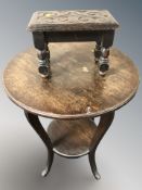 An oak circular two tier occasional table and a further carved oak stool