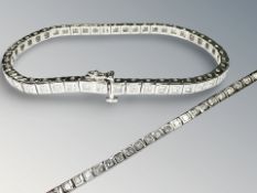 An 18ct white gold baguette diamond bracelet, set with 46 stones, approximately 2.7 ct.