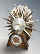 A Metamec sunburst quartz wall timepiece,
