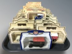 A collection of Lledo boxed die cast delivery vans.